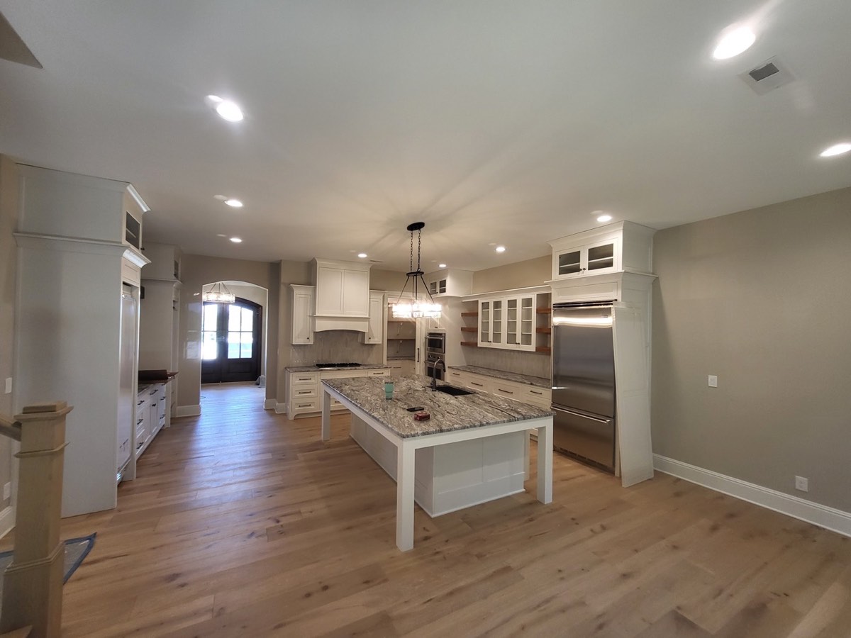 Complete kitchen renovation with custom cabinetry and premium countertops